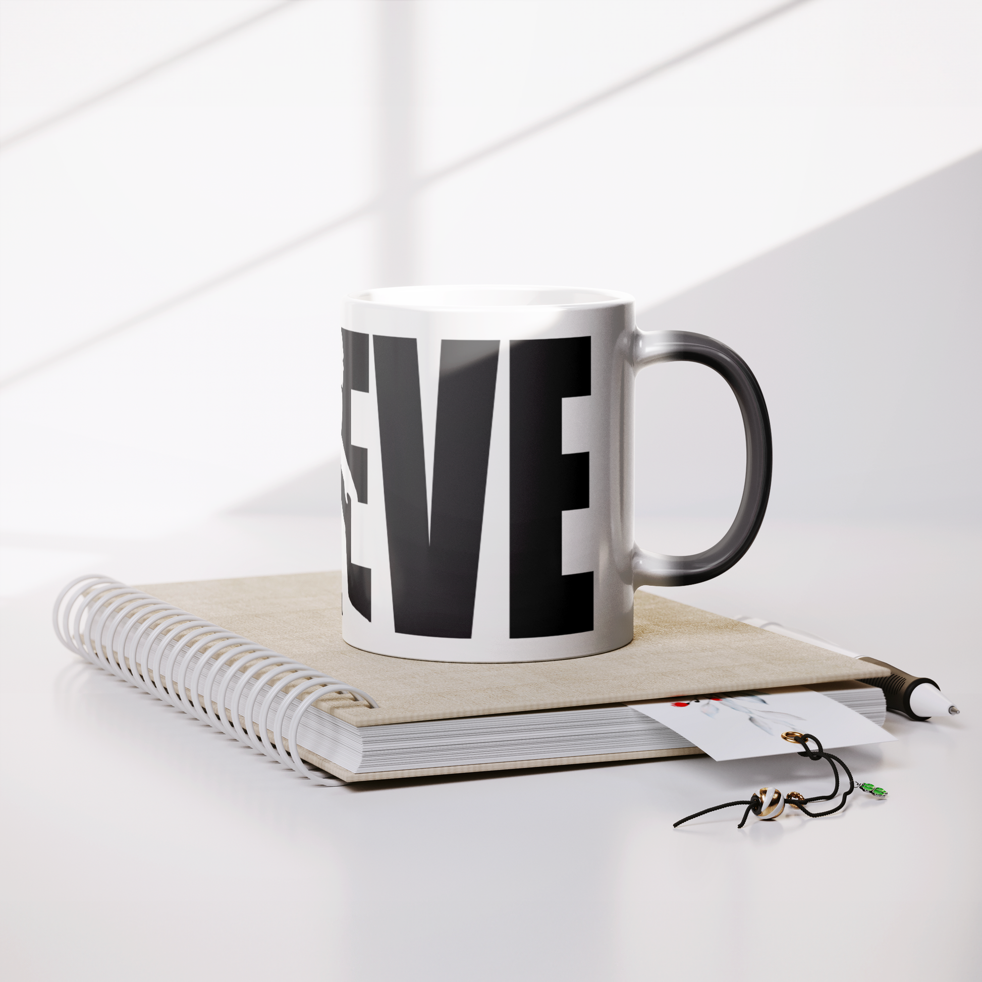 Believe_Magic_Mug_Lifestyle_Notebook_Mockup.png