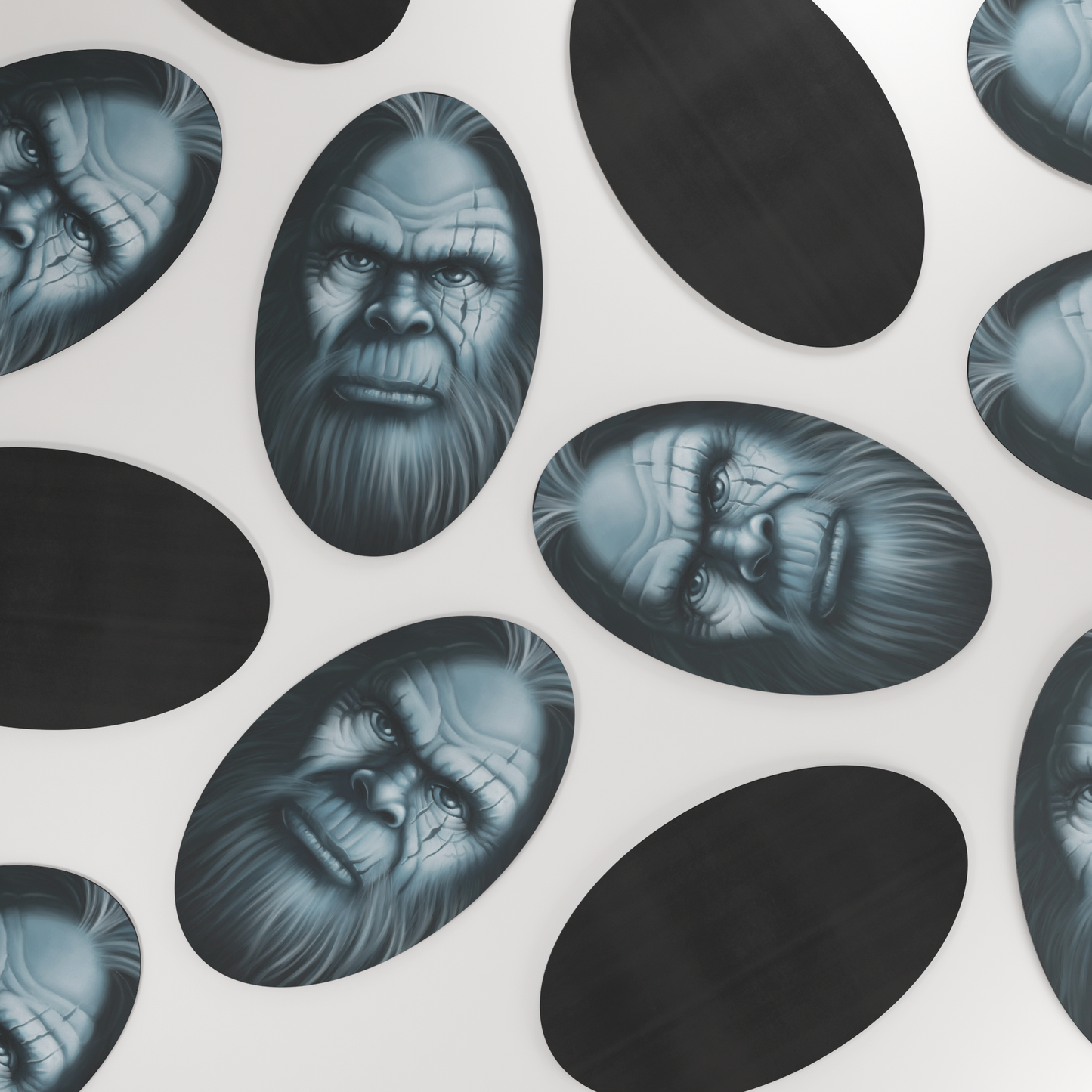 Bigfoot_Face_Magnet_OvalCarMagnet_Scattered_V_Mockup.png