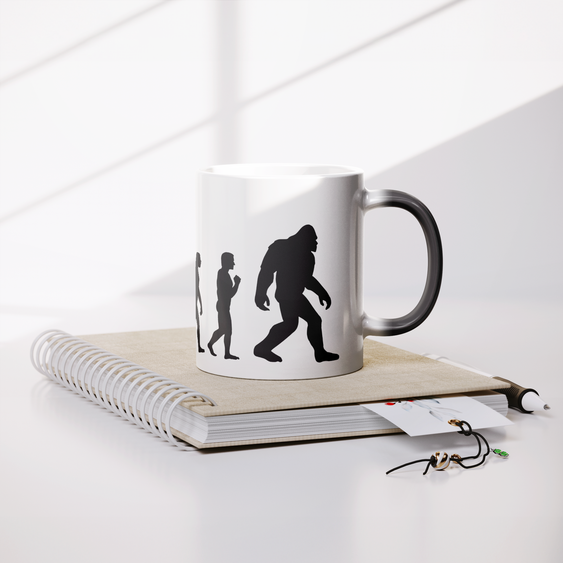 Evolution_Magic_Mug_Lifestyle_Notebook_Mockup.png